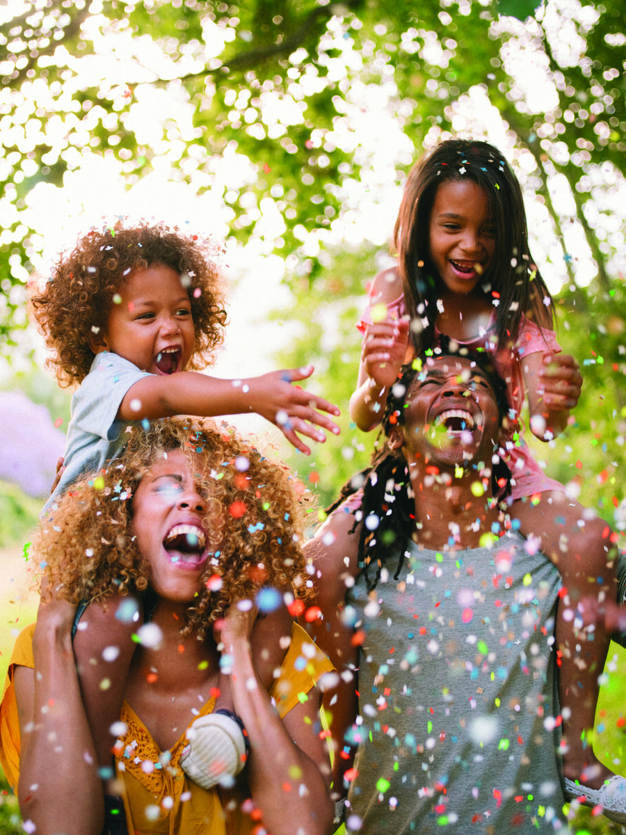 Family celebrating with confetti