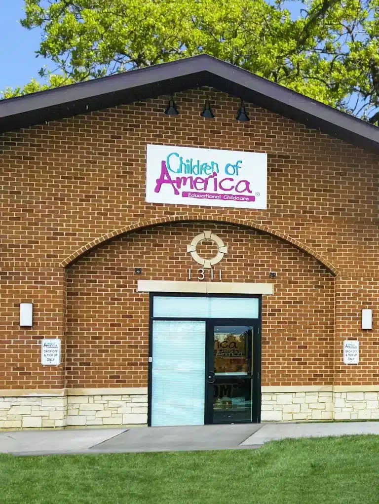 Oswego portrait Children of America Oswego school entrance